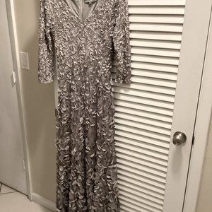 Theia Size 6 gown/mid length sleeve/super comfortable/petal treatment